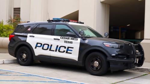 cedar hills police cruiser taking criminals to jail
